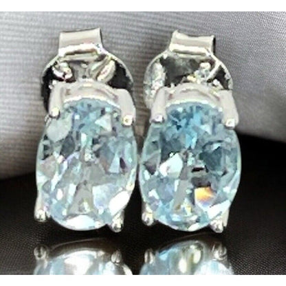 LUXY Gems Natural Blue Topaz Sterling Silver Earrings (1.8 cts.) Luxury Fashion