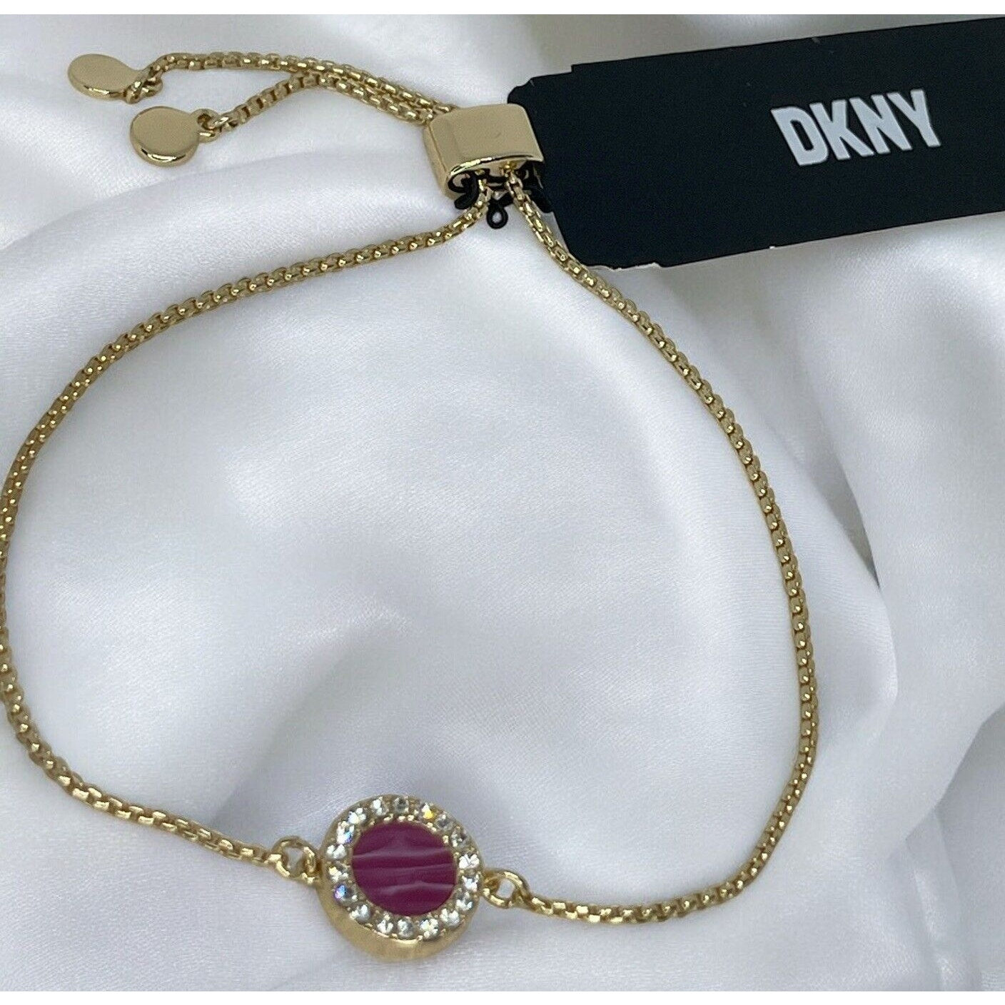 DKNY Gold Tone Crystal Slider Bracelet Circle Charm Fashion Stunning Chic Trendy